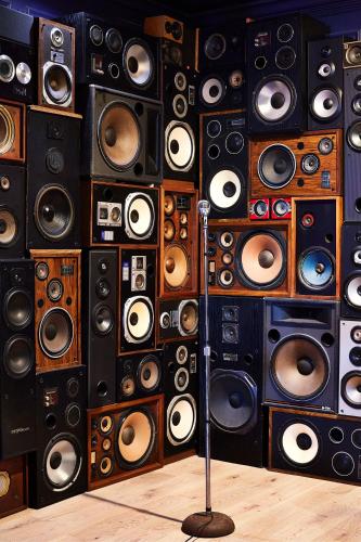 a wall filled with lots of different types of speakers at Hotel Dena, Pasadena Los Angeles, a Tribute Portfolio Hotel in Pasadena