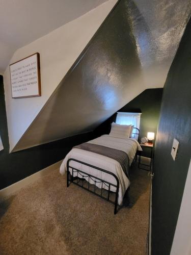 Ένα ή περισσότερα κρεβάτια σε δωμάτιο στο Cozy Little Getaway