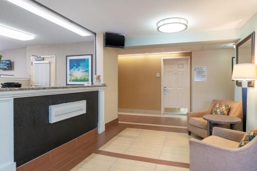 a lobby of a hospital with a waiting room at Candlewood Suites Washington-Dulles Herndon by IHG in Herndon