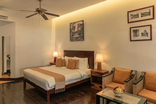 Postel nebo postele na pokoji v ubytování Pavillon d'Orient Boutique Hotel