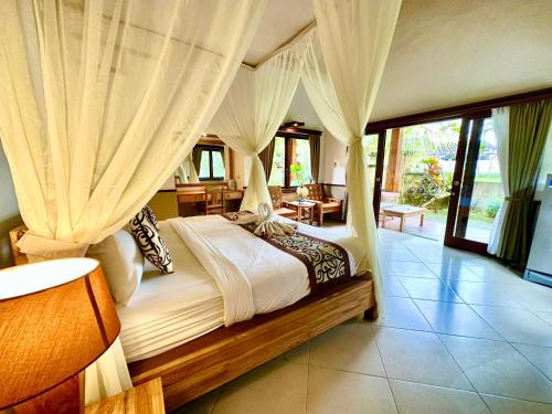 Cama o camas de una habitación en Dupa Ubud