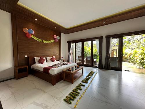 Cama o camas de una habitación en Dupa Ubud