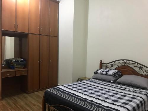 Postel nebo postele na pokoji v ubytování Samba Guest House, Kota Bharu, Kelantan