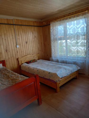 Katil atau katil-katil dalam bilik di Energy Guest House