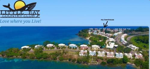 a rendering of a resort on an island in the water at Irie Vibes Ocean View in Negril