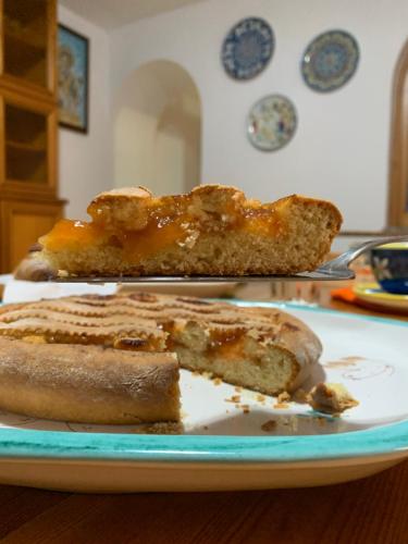 a plate with two pieces of bread on a table at B&B Zia Bianca in Vietri sul Mare