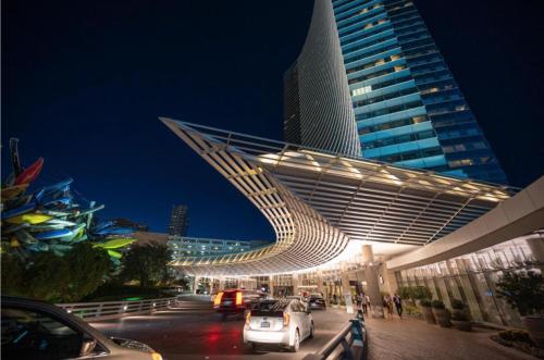 a building with a spiral staircase on the side of it at VDARA Beautiful suite on 22nd FLR Free Valet parking in Las Vegas