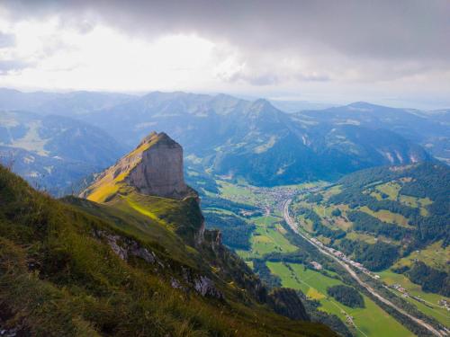 a view of a mountain with a river in a valley at Löchle. Ferienhütte im Bregenzerwald, Andelsbuch in Andelsbuch