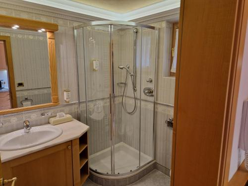 a bathroom with a shower and a sink at Residence Ciastel in Ortisei