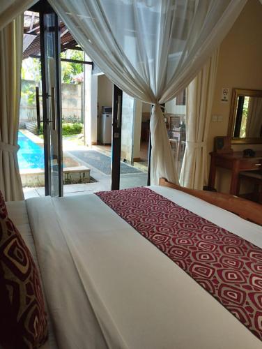 La alberca dentro o cerca de Kartika Dahayu Private Pool Villas