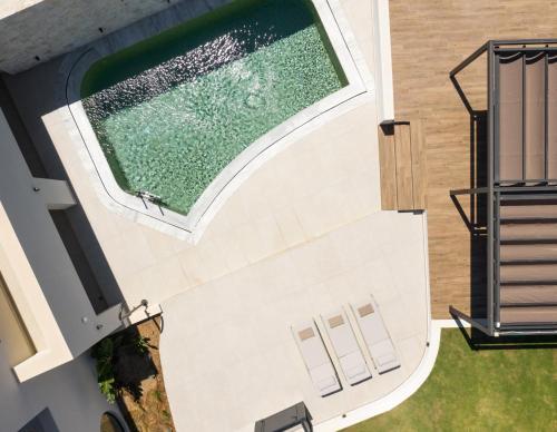 an overhead view of a swimming pool with a window at Fodele Beach Water Park Resort in Fodele