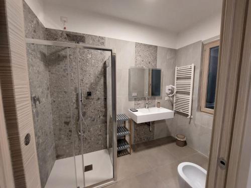 a bathroom with a shower and a sink at Residenza Elba - Charme House in Termoli
