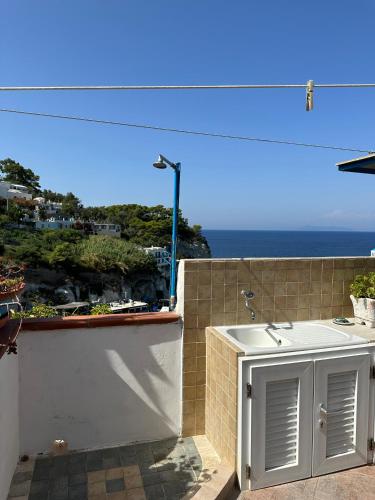 a view of the ocean from a balcony of a house at Casa Talento in Ponza