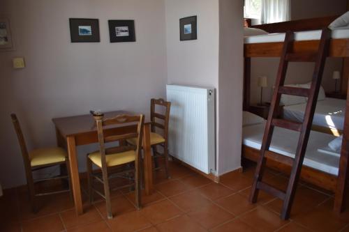Ένα ή περισσότερα κρεβάτια σε δωμάτιο στο Ithakiholidays