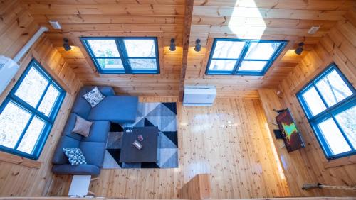 an overhead view of a living room in a tiny house at Wadano Gateway Suites & Apartments in Hakuba