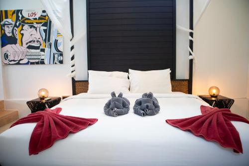Postel nebo postele na pokoji v ubytování White Sand Beach Villa 32B
