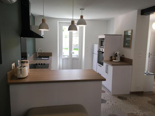 Una cocina o zona de cocina en Gîte l'Echappée Belle