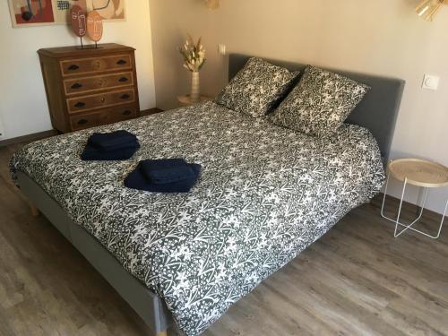 Cama o camas de una habitación en Gîte l'Echappée Belle