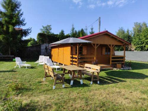 Klimatyczne domy, Ryn Mazury Lawki