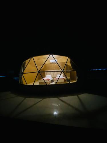 a close up of a mirror of a room at Syndebad desert camp in Wadi Rum