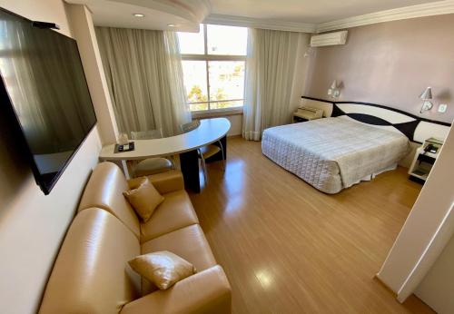 Ένα ή περισσότερα κρεβάτια σε δωμάτιο στο Hotel Maerkli