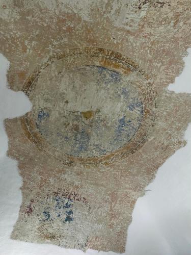 a close up of a painting on a wall at Le Tre Ca', Ca' Cecilia, Ca' Nina, Ca' Vittoria in Asti
