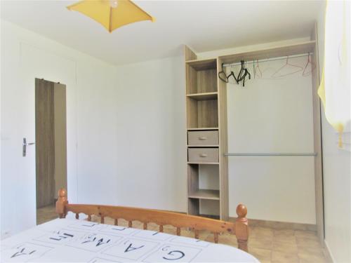 En eller flere senge i et værelse på LA ORANA