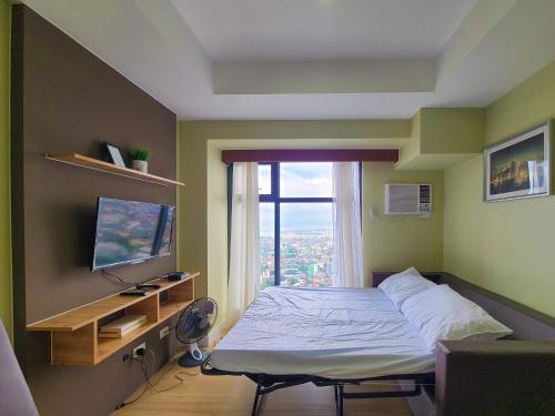 Μια τηλεόραση ή/και κέντρο ψυχαγωγίας στο Suite 1 Bedroom with Seaview-Horizons 101
