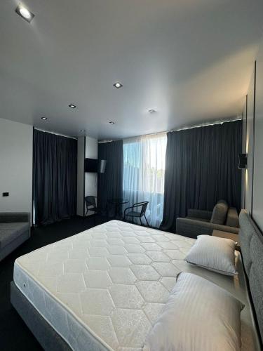 Postel nebo postele na pokoji v ubytování HOTEL SOBRANIE