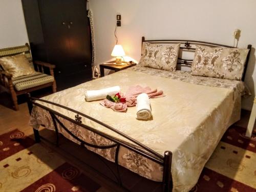Ένα ή περισσότερα κρεβάτια σε δωμάτιο στο Tanias House