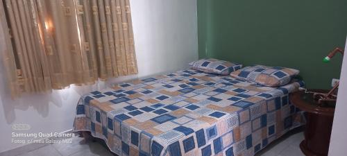 Postel nebo postele na pokoji v ubytování apartamento confortável