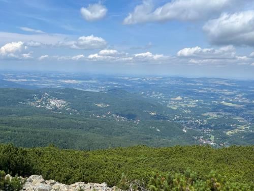 a view of a city from the top of a mountain at U Gruszków - domek pod Chojnikiem in Jelenia Góra