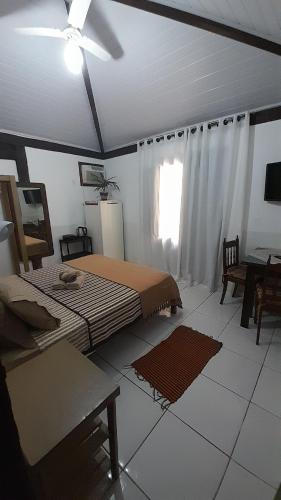 Postel nebo postele na pokoji v ubytování Flats do Portal Suite LUA