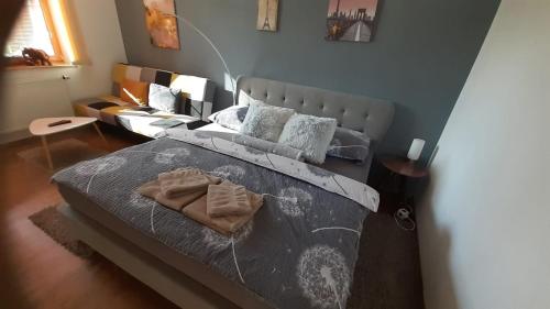 Ένα ή περισσότερα κρεβάτια σε δωμάτιο στο Green Apartment