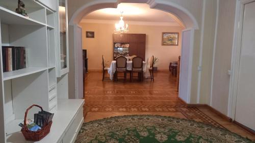 a hallway with a table and chairs in a house at Baleni in Sisian