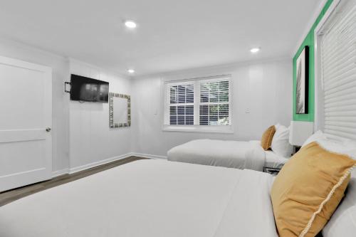 Ένα ή περισσότερα κρεβάτια σε δωμάτιο στο 8 Beds In 4br Home W Hot Tubfamily & Work-ready