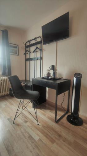 Roastineer Hotelにあるテレビまたはエンターテインメントセンター