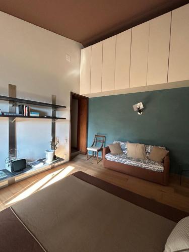 a living room with a couch and a table at Bed&Breakfast La Madonnina in Marlia