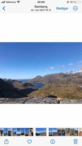 a screenshot of a website with a view of a mountain at Mørkveden feriehus, Lofoten in Ramberg