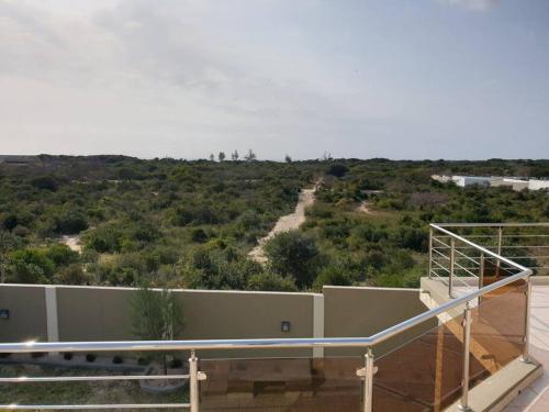 a view from the balcony of a house at Casabella-macaneta in Praia de Macaneta