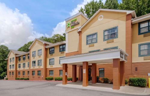 a rendering of a hotel with a building at Extended Stay America Select Suites - Atlanta - Alpharetta - Rock Mill Rd in Alpharetta