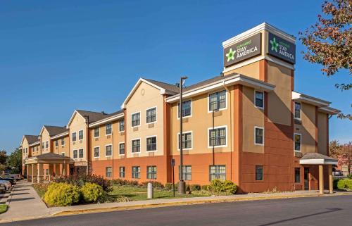a hotel building with a clock tower on top of it at Extended Stay America Suites - Frederick - Westview Dr in Frederick