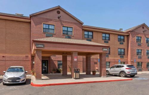 a building with a car parked in front of it at Extended Stay America Suites - Stockton - March Lane in Stockton