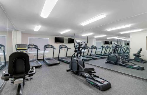 a gym with a lot of treadmills and exercise bikes at Extended Stay America Suites - San Jose - Milpitas - McCarthy Ranch in Milpitas