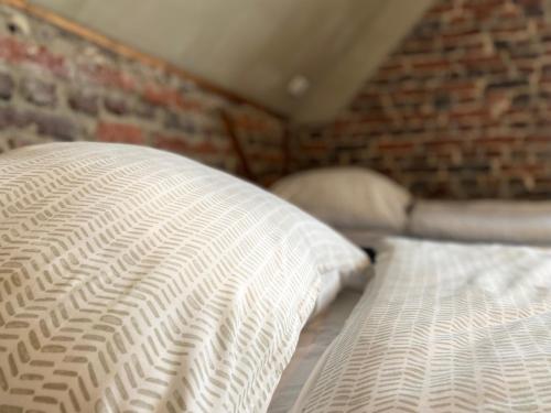 Una cama o camas en una habitación de PHOENIX Apartments - Monteurwohnung mit RIESIGER Parkfläche