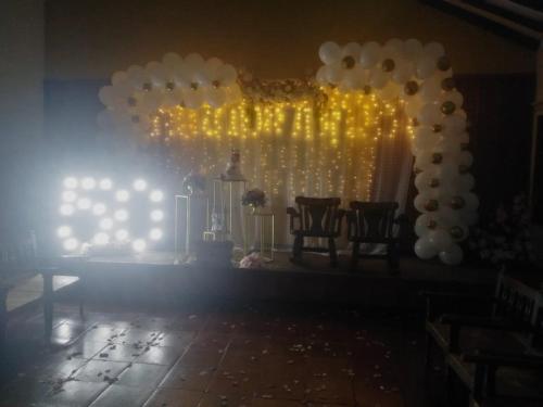 a room with a bunch of balloons and lights at Hotel MAXIRUMA - Villa TAMAUKA in Iza
