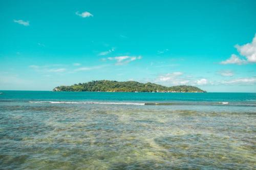 an island in the middle of the ocean at Kasakai Beachouse in Juan Gallego