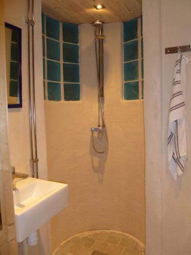 a bathroom with a sink and a shower and a sink at Houses by the sea near the city in Lidingö