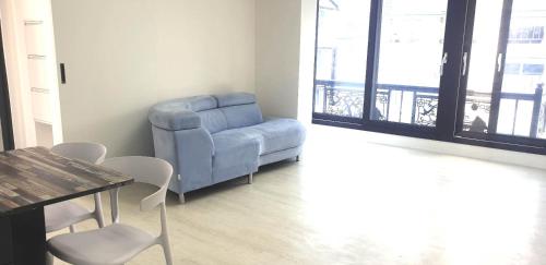 Predel za sedenje v nastanitvi Elle House