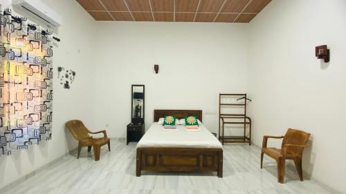 Cama o camas de una habitación en Elisha Place Hiriketiya